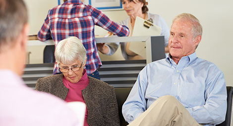 An older man waiting for an appointment